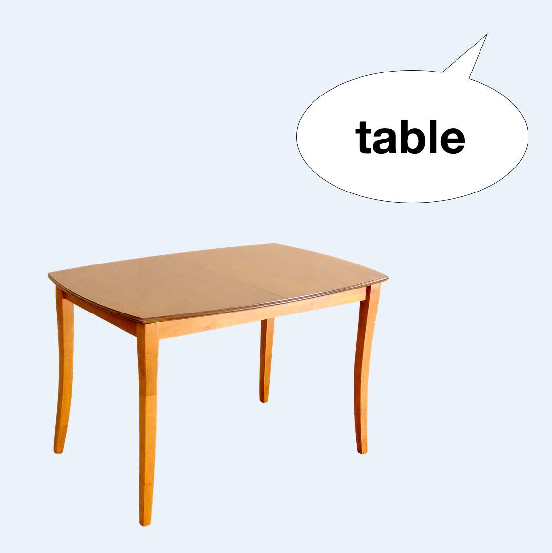 A wooden table with a speech bubble designed for an audience.